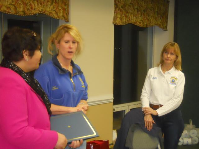 Patricia Copeland and Jayne Toellner with Evening Lions Club 1st VP Rashida MCravey